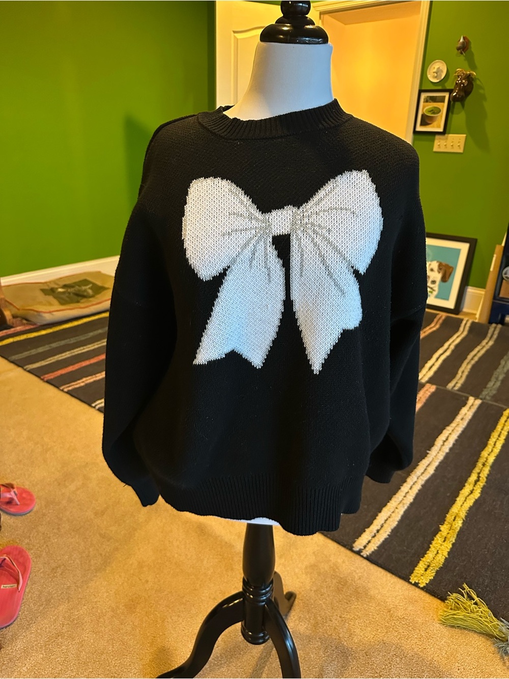 Eloquii Black Plus Size Sweater with White Bow Graphic